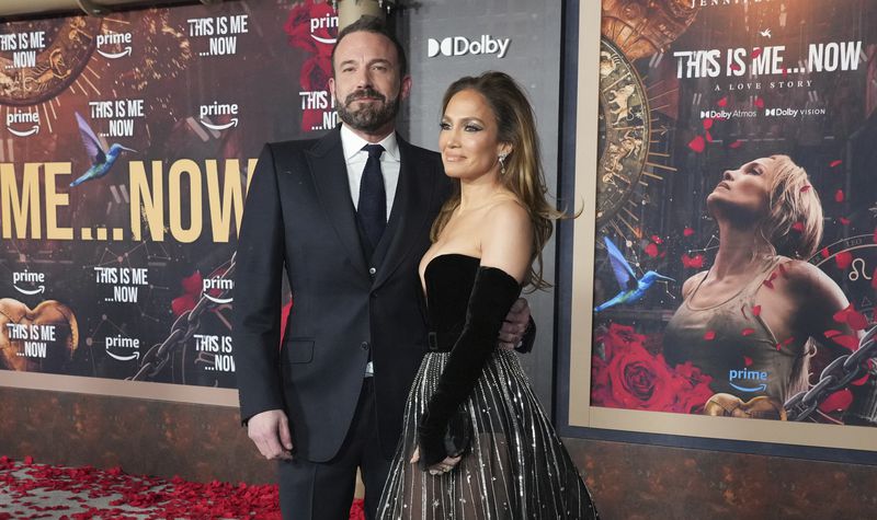 FILE - Ben Affleck, left, and Jennifer Lopez arrive at the premiere of "This Is Me... Now: A Love Story" on Feb. 13, 2024, in Los Angeles. (Photo by Jordan Strauss/Invision/AP, File)