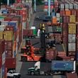 FILE - Containers are moved at the Port of New York and New Jersey in Elizabeth, N.J., on June 30, 2021. (AP Photo/Seth Wenig, File)