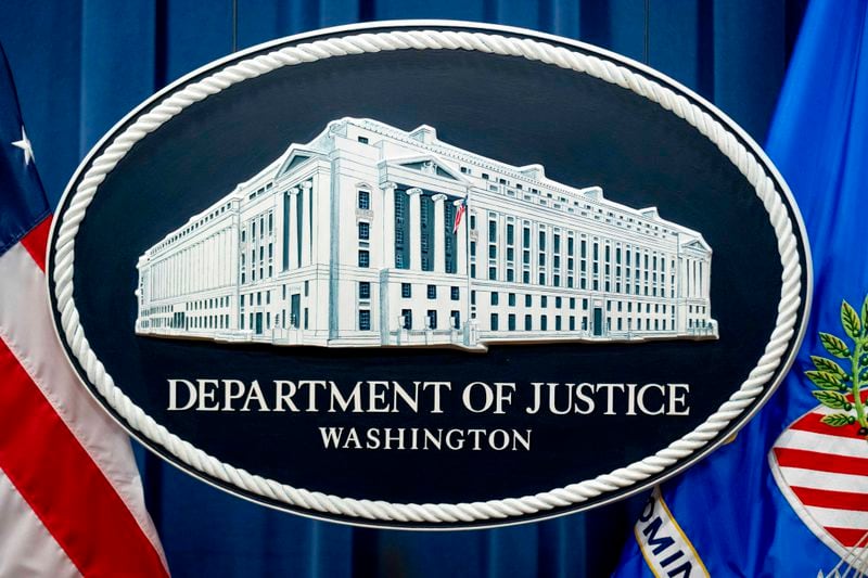 FILE - The Justice Department seal is seen, Nov. 18, 2022, in Washington. Two Lockheed Martin subsidiaries have agreed to pay the federal government $70 million for overcharging the Navy for aircraft parts, the U.S. Department of Justice announced Friday, June 21, 2024. (AP Photo/Andrew Harnik, File)