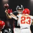 Atlanta Falcons quarterback Kirk Cousins (18) gets a pass off against the pressure of Kansas City Chiefs linebacker Drue Tranquill (23) during the second half at Mercedes-Benz Stadium, Sunday, Sept. 22, 2024, in Atlanta. The Falcons lost 22-17. (Jason Getz / AJC)

