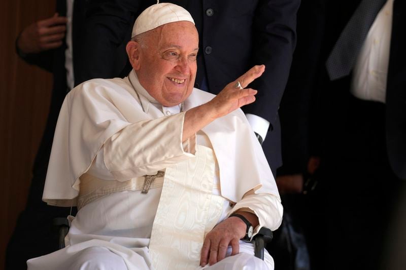 Pope Francis greets people in the Cathedral of the Immaculate Conception in Dili, East Timor, Tuesday, Sept. 10, 2024. (AP Photo/Dita Alangkara)