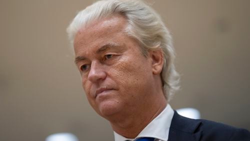 Anti-Islam lawmaker Geert Wilders, takes his seat at the high security court at Schiphol, near Amsterdam, Netherlands, Monday, Sept. 9, 2024, to hear the verdict against two Pakistani men on charges of threatening Wilders. (AP Photo/Peter Dejong)