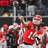 Georgia Bulldogs quarterback Carson Beck (15) throws downfield against the TCU Horned Frogs during the second half of the College Football Playoff National Championship at SoFi Stadium in Los Angeles on Monday, January 9, 2023. Georgia won 65-7 and secured a back-to-back championship. (Hyosub Shin / Hyosub.Shin@ajc.com)