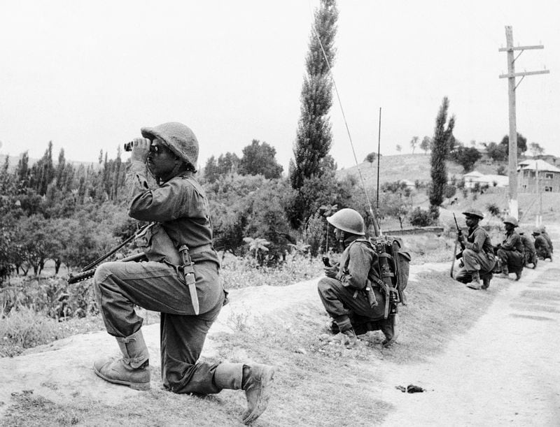 Indian troops are on the move in Kashmir against guerrilla forces during the second war over Kashmir on Sept. 6, 1965. (AP Photo/File)