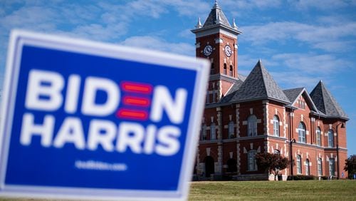 201106-Jonesboro-A Biden-Harris sign stands on the lawn in front of the Historic Clayton County Courthouse in Jonesboro on Friday morning, Nov. 6, 2020 after the county pushed Joe Biden into the lead in Georgia election results. (Ben Gray for the Atlanta Journal-Constitution)
