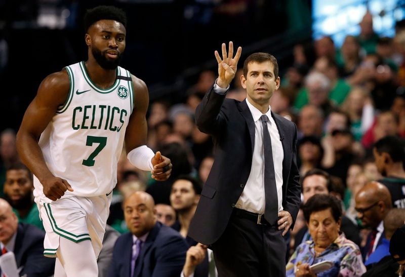 Boston Celtics head coach Brad Stevens call a play in front of guard Jaylen Brown (7) against the Cleveland Cavaliers during the third quarter of the Eastern conference finals of the 2018 NBA Playoffs at TD Garden.