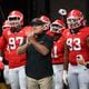 Georgia head coach Kirby Smart walks with defensive lineman Warren Brinson (97), wide receiver Arian Smith (11) and defensive lineman Tyrion Ingram-Dawkins (93) before their game against Clemson at Mercedes-Benz Stadium, on Saturday, Aug. 31, 2024, in Atlanta. (Jason Getz / AJC)
