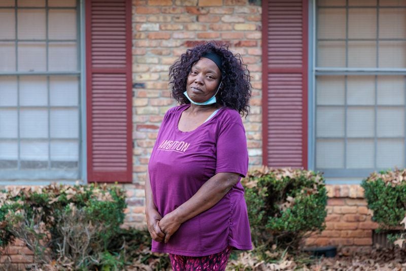 Chiquita Carter, community living coach in a group home for people with disabilities in Tucker, poses for a portrait on Wednesday, November 9, 2022.   (Arvin Temkar / arvin.temkar@ajc.com)