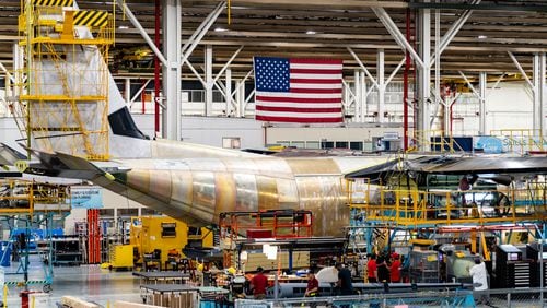 A C-130J cargo aircraft undergoes construction at Lockheed Martin's manufacturing facility in Marietta on Thursday, Aug. 22. (Seeger Gray/AJC)