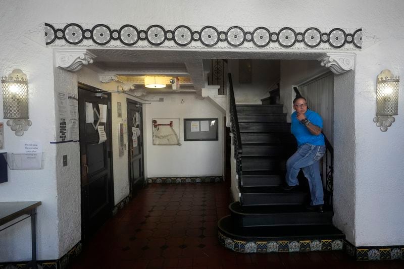 Brandi Marshall, Five Keys director of housing services, walks up the stairs while interviewed at a Five Keys transitional housing location in San Francisco, Monday, Aug. 26, 2024. (AP Photo/Jeff Chiu)