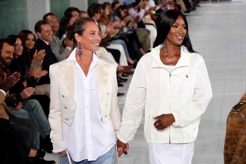 Christy Turlington, left, and Naomi Campbell walk the runway during the Ralph Lauren Spring/Summer 2025 fashion show as part of New York Fashion Week on Thursday, Sept. 5, 2024, at Khalily Stables in Bridgehampton, N.Y. (Photo by Charles Sykes/Invision/AP)