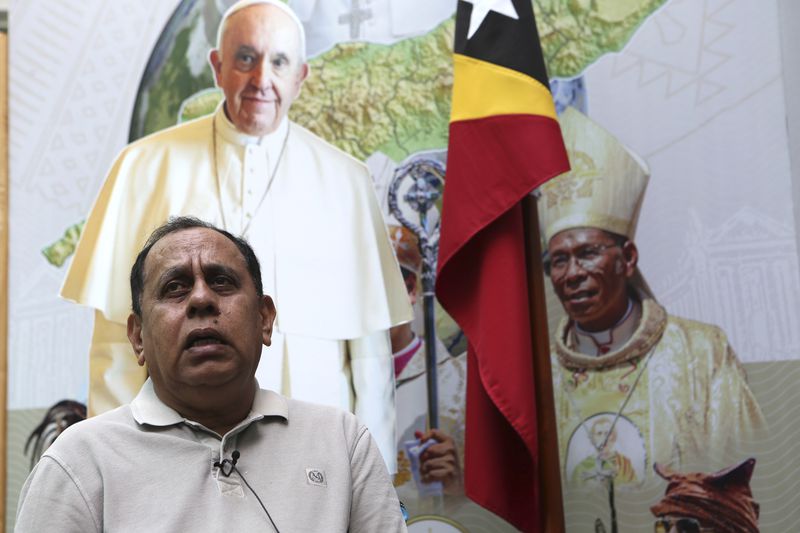 East Timor's Minister of State Administration, Tomas Cabral, who heads the national organizing committee for the pope's visit, speaks with a reporter in Dili, East Timor, Thursday, Sept. 5, 2024. (AP Photo/Firdia Lisnawati)