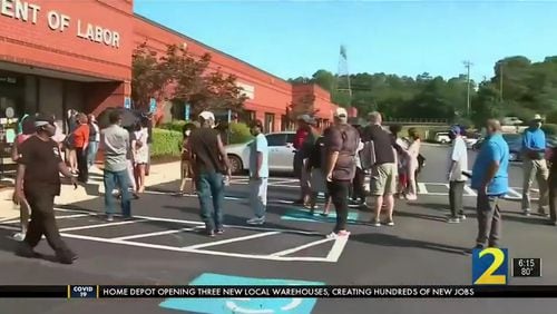 Georgians who say they've been denied unemployment benefits gather at a Department of Labor office in Gwinnett County last week. WSB-TV