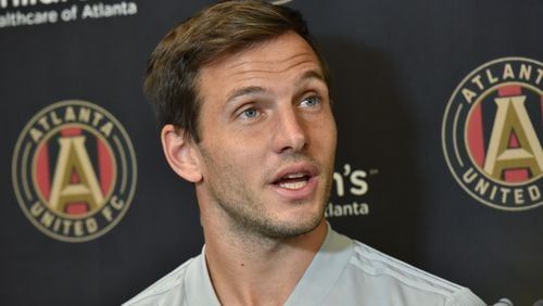 Midfielder Kevin Kratz (32) speaks to members of the press before Tuesday's practice at Children's Healthcare of Atlanta Training Ground in Marietta. (Hyosub Shin/hshin@ajc.com)