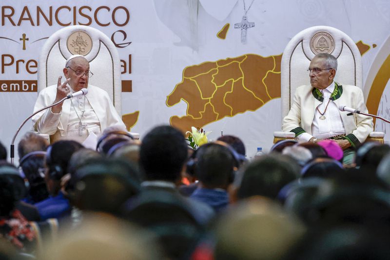 Pope Francis delivers his address as East Timor President Jose Ramos-Horta listens, right, during a meeting with East Timor authorities, civil society, and the diplomatic corps at the Presidential Palace in Dili, East Timor, Monday, Sept. 9, 2024. (Willy Kurniawan/Pool Photo via AP)