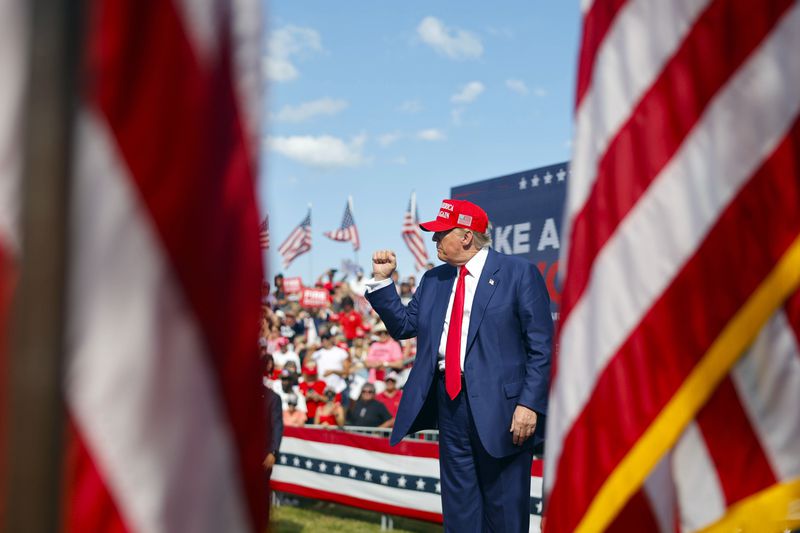 Republican presidential candidate former President Donald Trump walks off the stage after speaking at a campaign event Tuesday, June 18, 2024, in Racine, Wis. (AP Photo/Jeffrey Phelps)