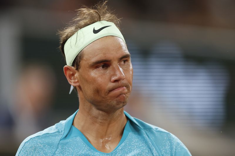 Spain's Rafael Nadal grimaces after missing a shot against Germany's Alexander Zverev during their first round match of the French Open tennis tournament at the Roland Garros stadium in Paris, Monday, May 27, 2024. (AP Photo/Jean-Francois Badias)