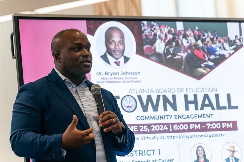 Bryan Johnson, the new superintendent of Atlanta Public Schools, speaks to members of the community at The New School at Carver in Atlanta on Tuesday, June 25, 2024. (Seeger Gray/AJC)