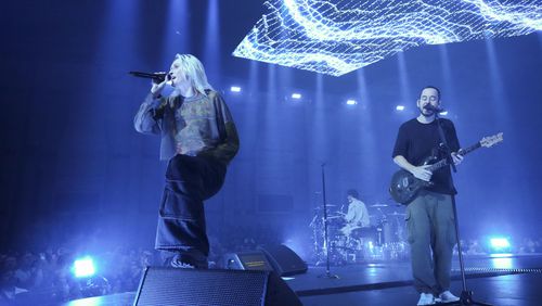 Emily Armstrong, from left, Colin Brittain, and Mike Shinoda of Linkin Park performs Thursday, Sept. 5, 2024, in Los Angeles. It was announced on Thursday that Dead Sara's Emily Armstrong would join as the band's new co-singer and songwriter/producer Colin Brittain would join on drums. Linkin Park will release the album "From Zero" on Nov. 15, marking their first new record since former frontman Chester Bennington died in 2017. (Photo by Jordan Strauss/Invision/AP