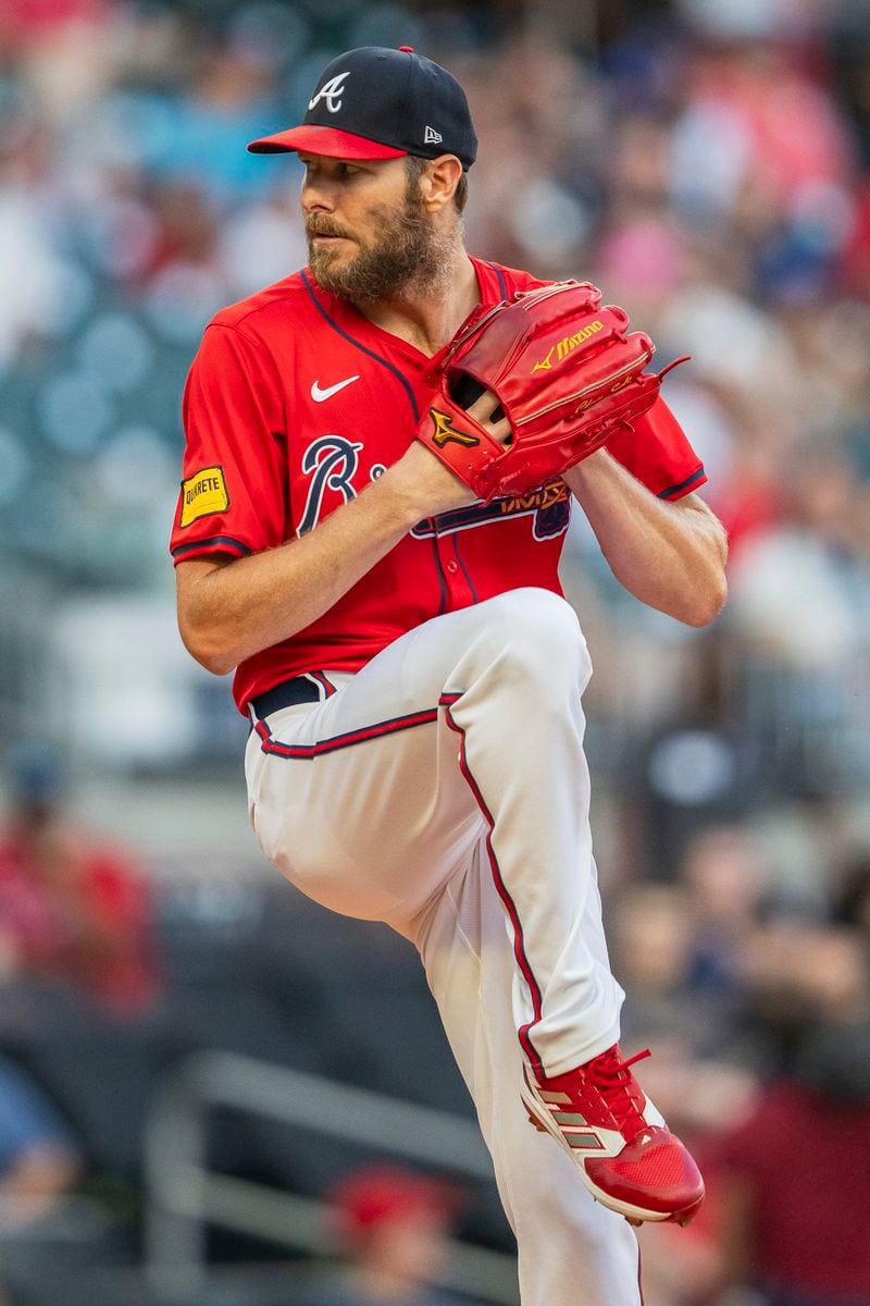 Atlanta Braves pitcher Chris Sale winds up in the first inning of a baseball game against the Washington Nationals, Friday, Aug. 23, 2024, in Atlanta. (AP Photo/Jason Allen)