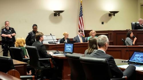 Colt Gray, left, made his first court appearance Friday in Winder, where he learned he could face life in prison without parole for allegedly gunning down two of his classmates and two teachers. (Brynn Anderson/Pool/Getty Images/TNS)