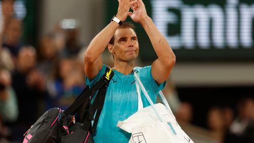 Spain's Rafael Nadal waves as he leaves the court after losing against Germany's Alexander Zverev during their first round match of the French Open tennis tournament at the Roland Garros stadium in Paris, Monday, May 27, 2024. (AP Photo/Jean-Francois Badias)