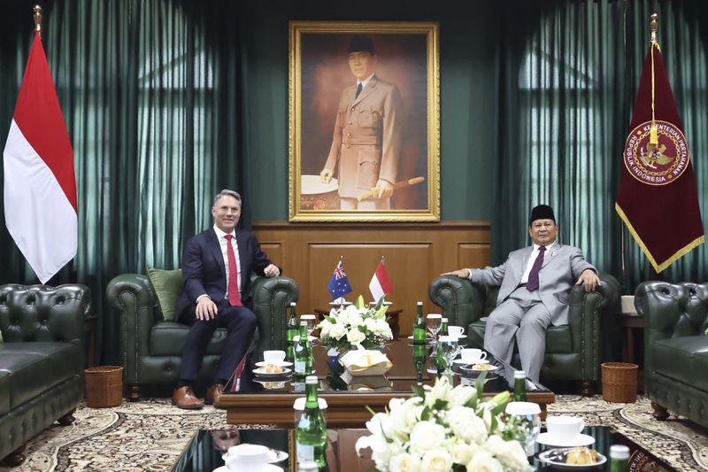 In this photo released by Indonesia's Ministry of Defense, Australia's Deputy Prime Minister and Defense Minister Richard Marles, left, meets with Indonesian Defense Minister Prabowo Subianto at the Military Academy in Magelang, Central Java, Indonesia, Thursday, Aug. 29, 2024. (Indonesian Ministry of Defense via AP)