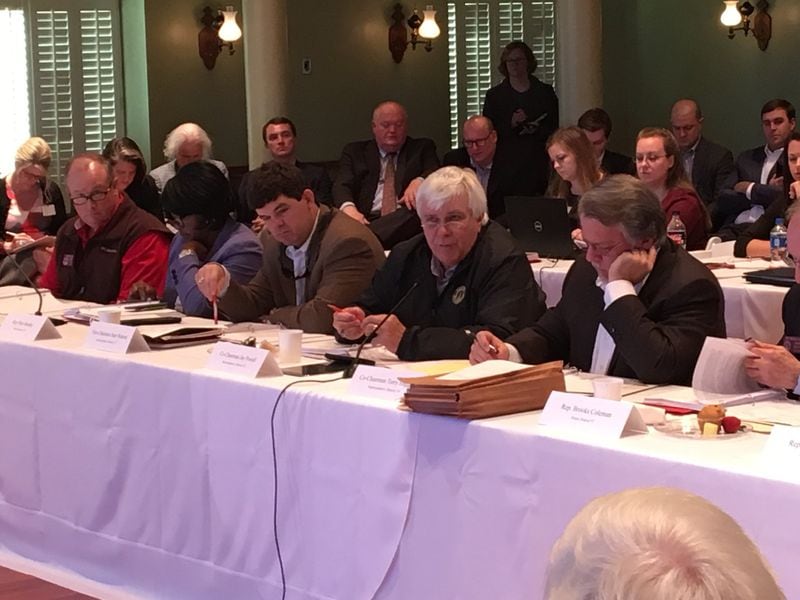 The Georgia House of Representatives Rural Development Council unanimously approved suggestions meant to boost the economy in rural areas at the Old Capitol Building in Milledgeville, Ga., on Wednesday, Dec. 13, 2017. Those seated in the center are, from left, Reps. Patty Bentley, Sam Watson, Jay Powell and Terry England. MARK NIESSE / MARK.NIESSE@AJC.COM The meeting was led by Rep. Jay Powell and Rep. Terry England, the co-chairmen of the council. MARK NIESSE / MARK.NIESSE@AJC.COM