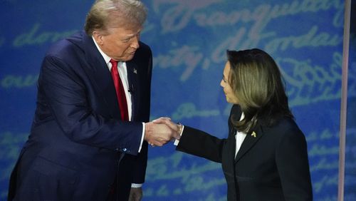 FILE - Republican presidential nominee former President Donald Trump and Democratic presidential nominee Vice President Kamala Harris shake hands before the start of an ABC News presidential debate at the National Constitution Center, Sept. 10, 2024, in Philadelphia. (AP Photo/Alex Brandon, file)