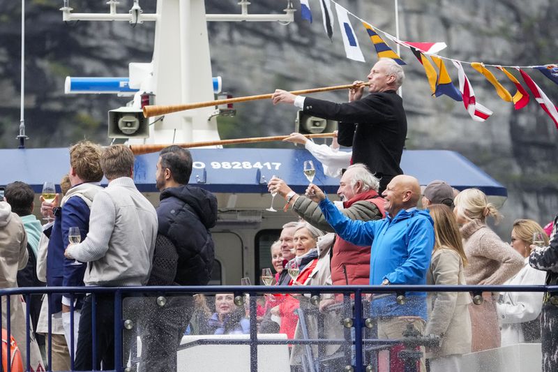 Guests are transported by boat from Alesund to Geiranger, Norway, Friday Aug. 30, 2024, for the wedding celebration of Princess Martha Louise and Durek Verret on Saturday. (Heiko Junge/NTB via AP)