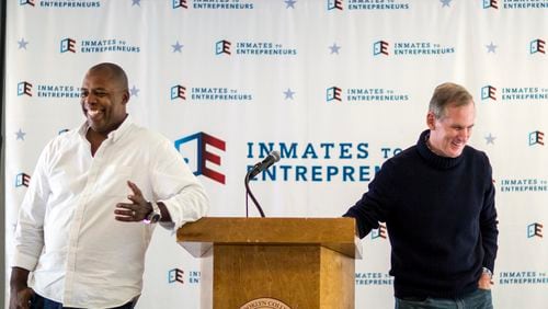 Inmates to Entrepreneurs co-chair, AJ Ware, left, and founder Brian Hamilton speak at a class in New York City during November 2018.
