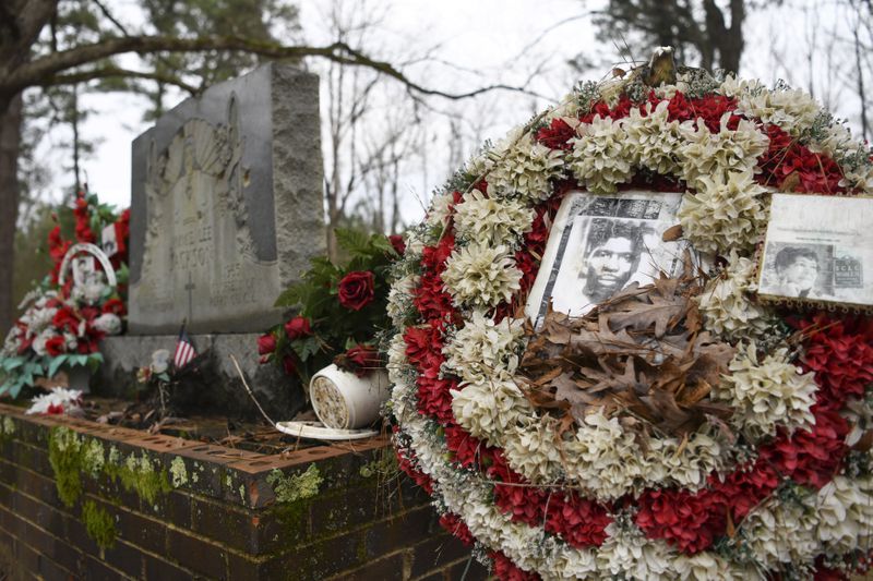 Wreaths and mementos adorned the grave of Jimmie Lee Jackson at Heard Cemetery in Marion, Alabama.