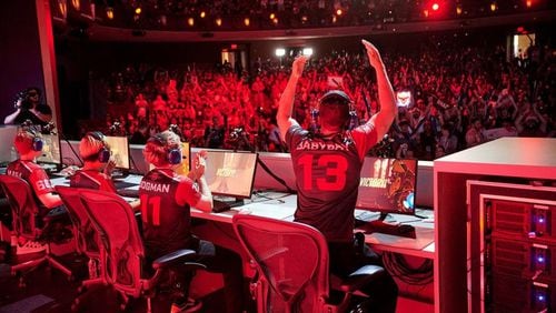 People play Overwatch in a tournament. AJC FILE PHOTO: Tonya McCahon for Blizzard Entertainment