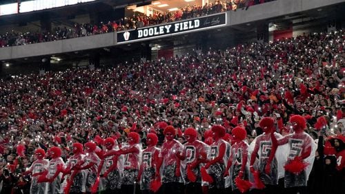 Georgia fans light up the stadium at the start of the fourth quarter during an NCAA football game against Mississippi at Sanford Stadium, Saturday, November 11, 2023, in Athens. Georgia won 52-17 over Mississippi. (Hyosub Shin / Hyosub.Shin@ajc.com)