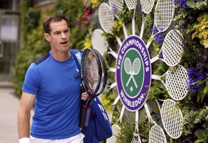 Britain's Andy Murray arrives at the practice court on day two of the Wimbledon tennis championships, in London, Tuesday, July 2, 2024. Murray will play only doubles at his last appearance at the All England Club following his withdrawal from singles after back surgery. (Jordan Pettitt/PA via AP)