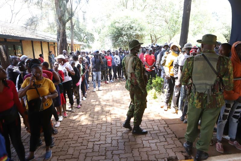 Members of the public queue to attend a public forum for an impeachment motion against Kenya's deputy president Rigathi Gachagua, at Bomas of Kenya, in Nairobi, Friday, Oct. 4, 2024. (AP Photo/Andrew Kasuku)