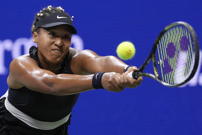 Naomi Osaka, of Japan, returns a shot to Karolina Muchova, of the Czech Republic, during the second round of the U.S. Open tennis championships, Thursday, Aug. 29, 2024, in New York. (AP Photo/Matt Rourke)