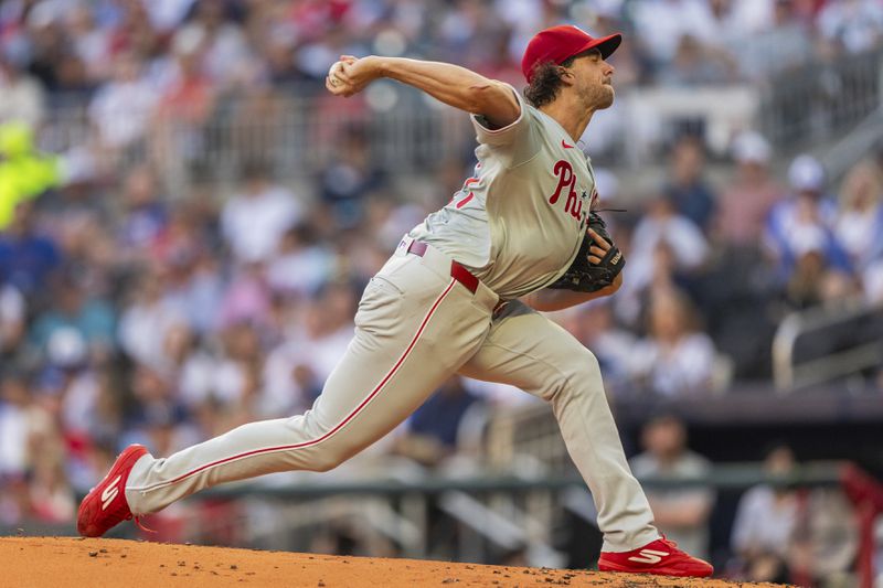 Philadelphia Phillies pitcher Aaron Nola throws in the first inning of a baseball game against the Atlanta Braves, Wednesday, Aug. 21, 2024, in Atlanta. (AP Photo/Jason Allen)