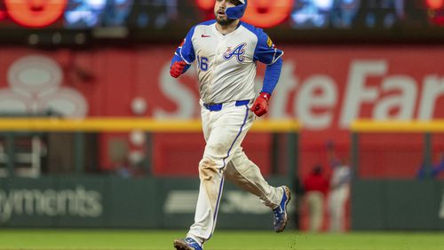 Atlanta Braves' Travis d'Arnaud rounds second base after hitting a walkoff home run to win a baseball game against the Kansas City Royals, Saturday, Sept. 28, 2024, in Atlanta. (AP Photo/Jason Allen)