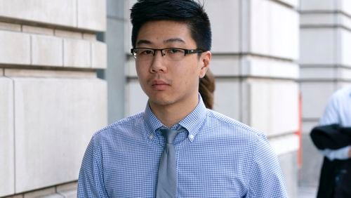 Montgomery County police officer Justin Lee arrives to the U.S. Federal Courthouse in Washington, Friday, Aug. 23, 2024. (AP Photo/Jose Luis Magana)