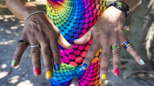 Michael Hills displays his colorful nail polish at the Pure Heat Community Festival in Piedmont Park on Sunday, Sept. 1, 2024.  (Olivia Bowdoin for the AJC).(Olivia Bowdoin for the AJC). 