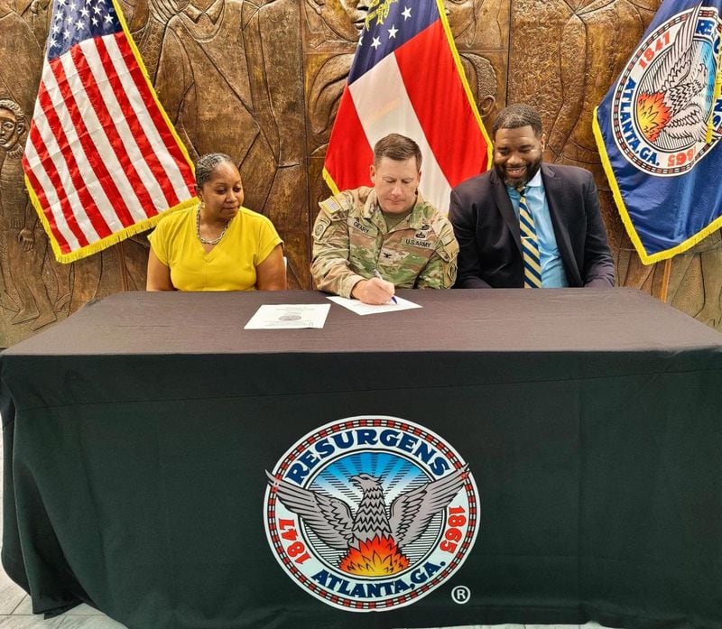 U.S. Army Corps of Engineers Colonel Joseph Geary (center) signed an agreement with Atlanta Watershed Commissioner Mikita Browning (left) and Atlanta Chief of Staff Odie Donald II on Friday, April 21, 2023, at City Hall. Atlanta and the Army Corpsare working together in an effort to address flooding at Lakewood Park.