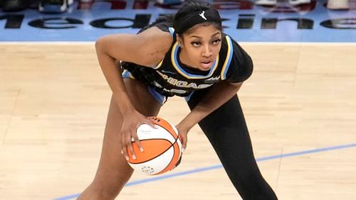 FILE - Chicago Sky's Angel Reese looks to pass during the team's WNBA basketball game against the Los Angeles Sparks on Thursday, May 30, 2024, in Chicago. (AP Photo/Charles Rex Arbogast, File)