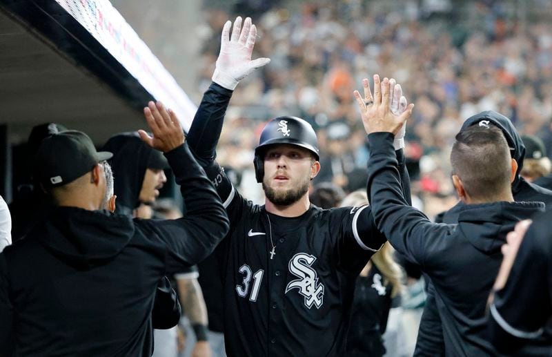 Chicago White Sox's Zach DeLoach (31) celebrates after hitting a home run against the Detroit Tigers during the sixth inning of a baseball game, Friday, Sept. 27, 2024, in Detroit. (AP Photo/Duane Burleson)