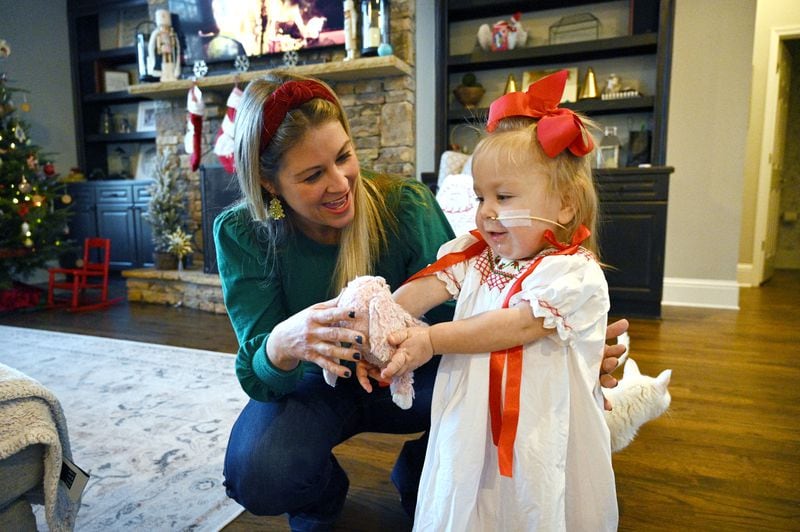 Emmie Mahoney arrived a few weeks early in March 2021, weighing 5 pounds, 7 ounces and suffering from a rare condition where both of her kidneys were missing. After two years of intensive medical care, she received a kidney from her mother Andi last July. (Hyosub Shin / Hyosub.Shin@ajc.com)