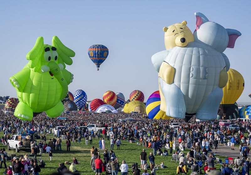 Hot air balloons take off during the mass ascension at the 52nd Albuquerque International Balloon Fiesta in Albuquerque, N.M., on Saturday, Oct. 5, 2024. (AP Photo/Roberto E. Rosales)