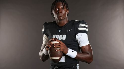 2024 AJC Super 11 Houston County quarterback AJ Hill at Houston County high school, Thursday, July 25, 2024, in Warner Robins, Ga. Hill is a 4-star quarterback in the class of 2025 and a Memphis verbal commitment. (Jason Getz / AJC)
