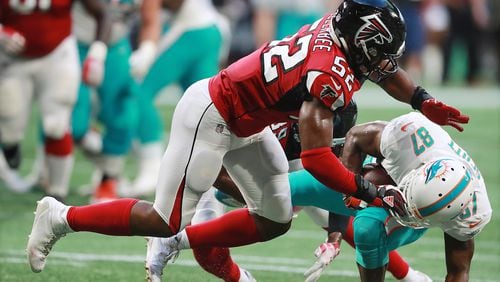 Falcons linebacker Emmanuel Ellerbee levels Miami Dolphins wide receiver Rashawn Scott during the first quarter in a NFL preseason game on Thursday, August 30, 2018, in Atlanta.  Curtis Compton/ccompton@ajc.com