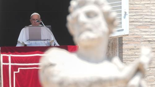 Pope Francis delivers the Angelus noon prayer in St. Peter's Square, at the Vatican, Sunday, July 21, 2024. (AP Photo/Gregorio Borgia)