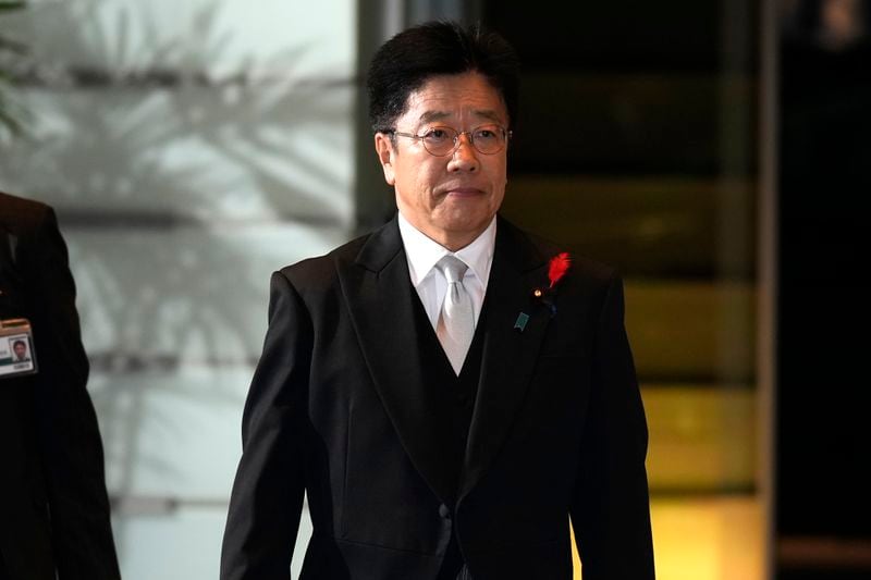 Katsunobu Kato, newly appointed Minister of Finance, arrives at the prime minister's office Tuesday, Oct. 1, 2024, in Tokyo. (AP Photo/Hiro Komae)